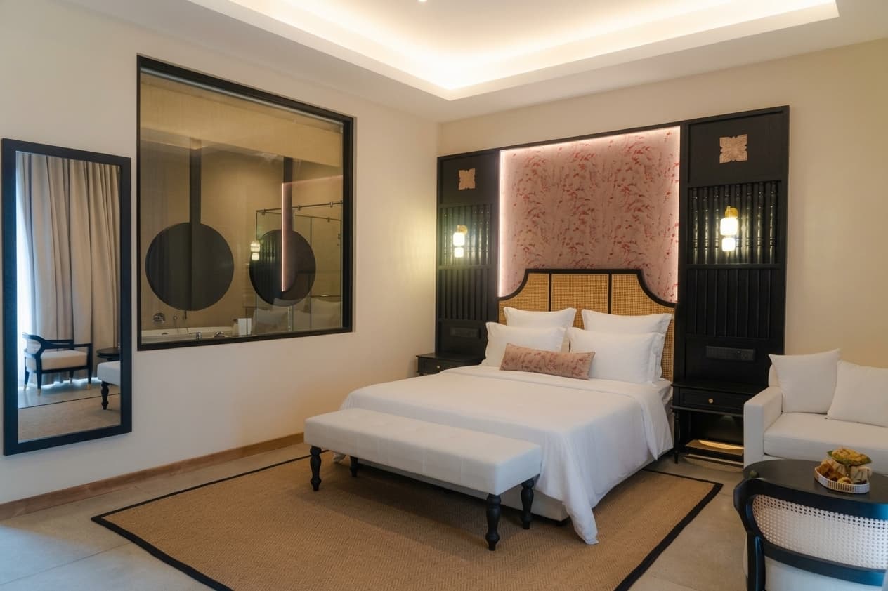 Photograph of a Deluxe Room seen from the doorway.