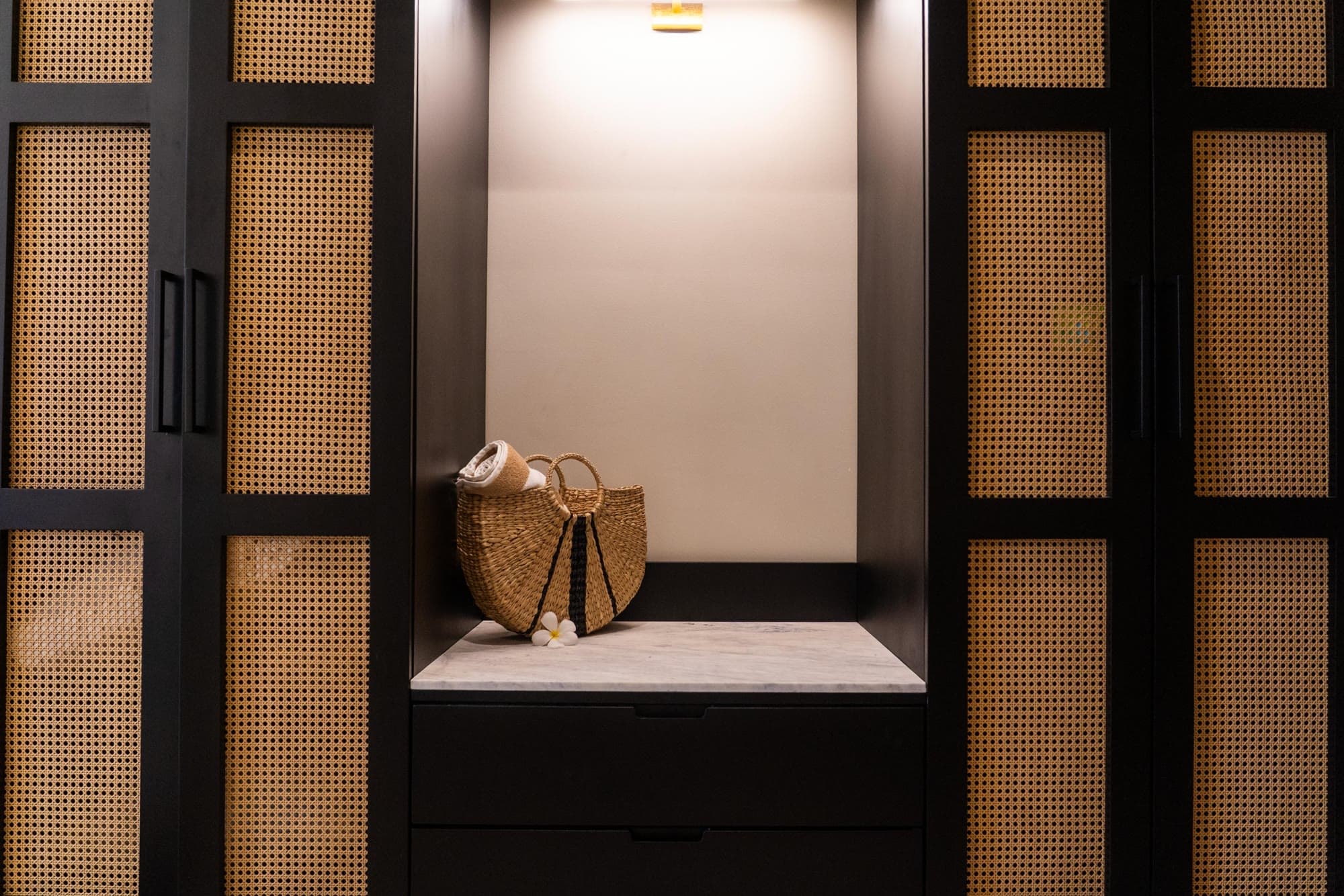 Photograph of the fitted wardrobe of a Deluxe Room.