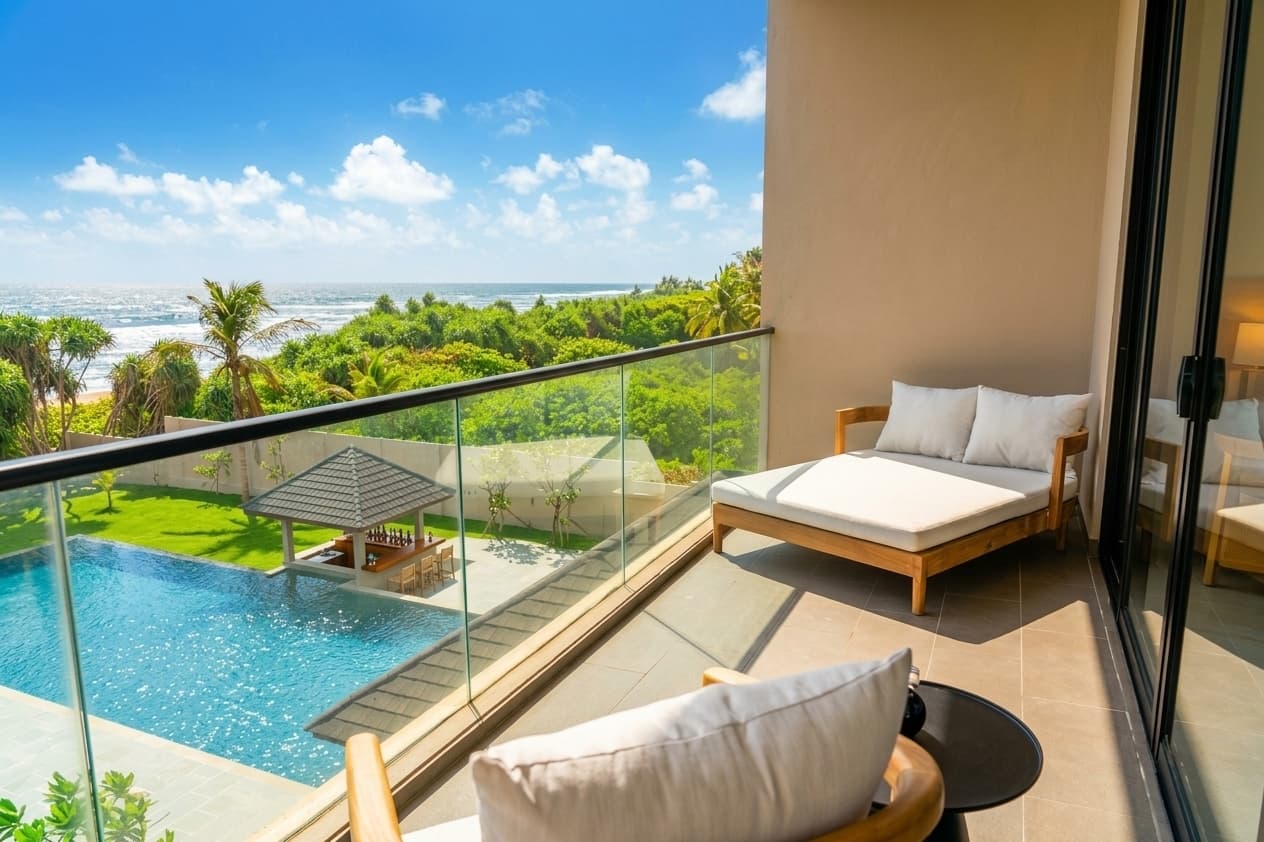 Photograph of the ocean seen from a sea-view room.